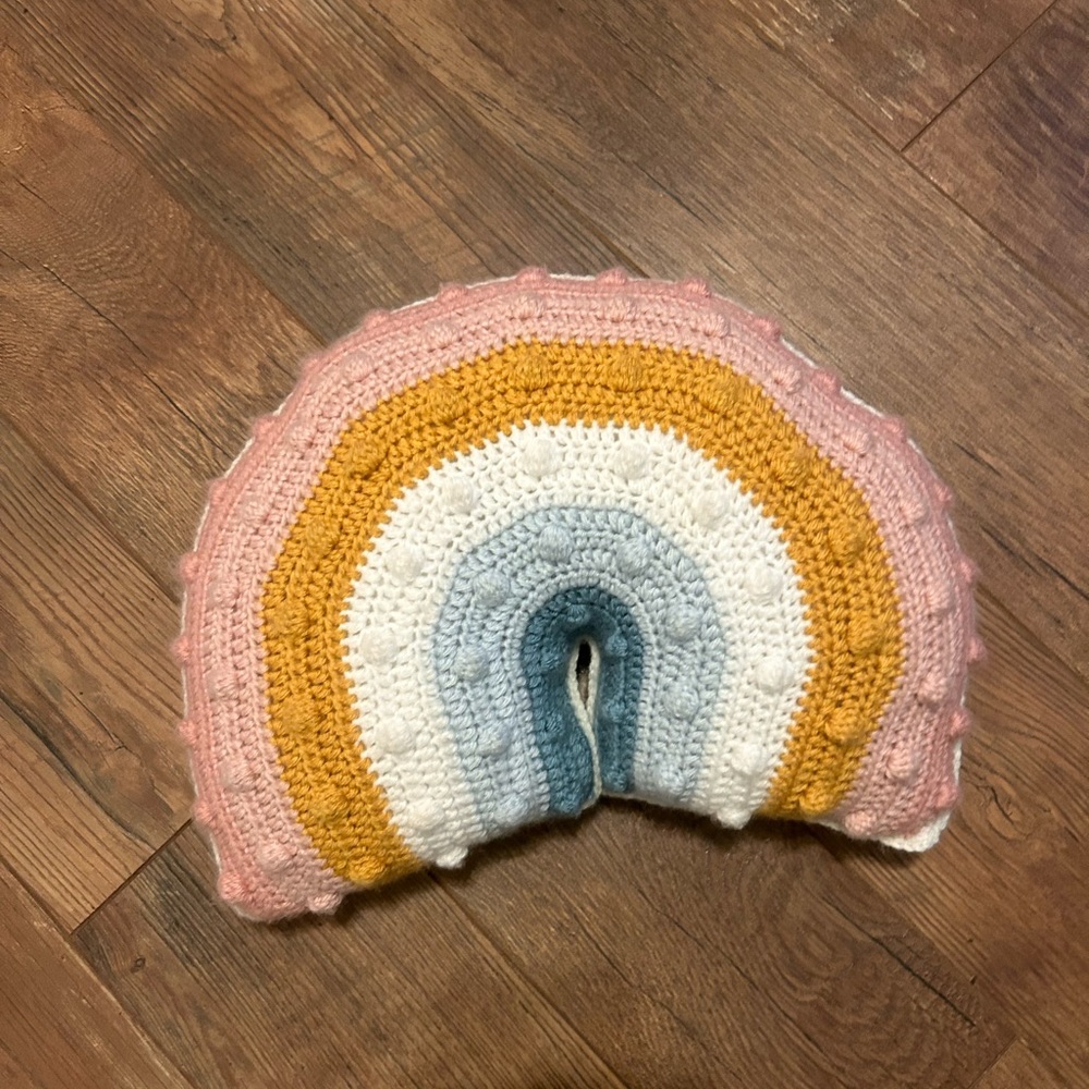 Crochet rainbow pillow